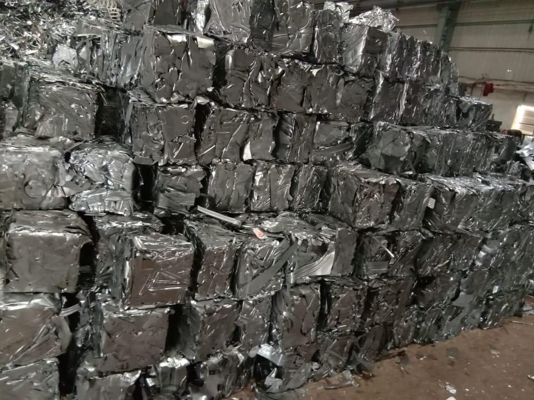 Stacked CRC bundle scrap inside a Yashu Iron warehouse